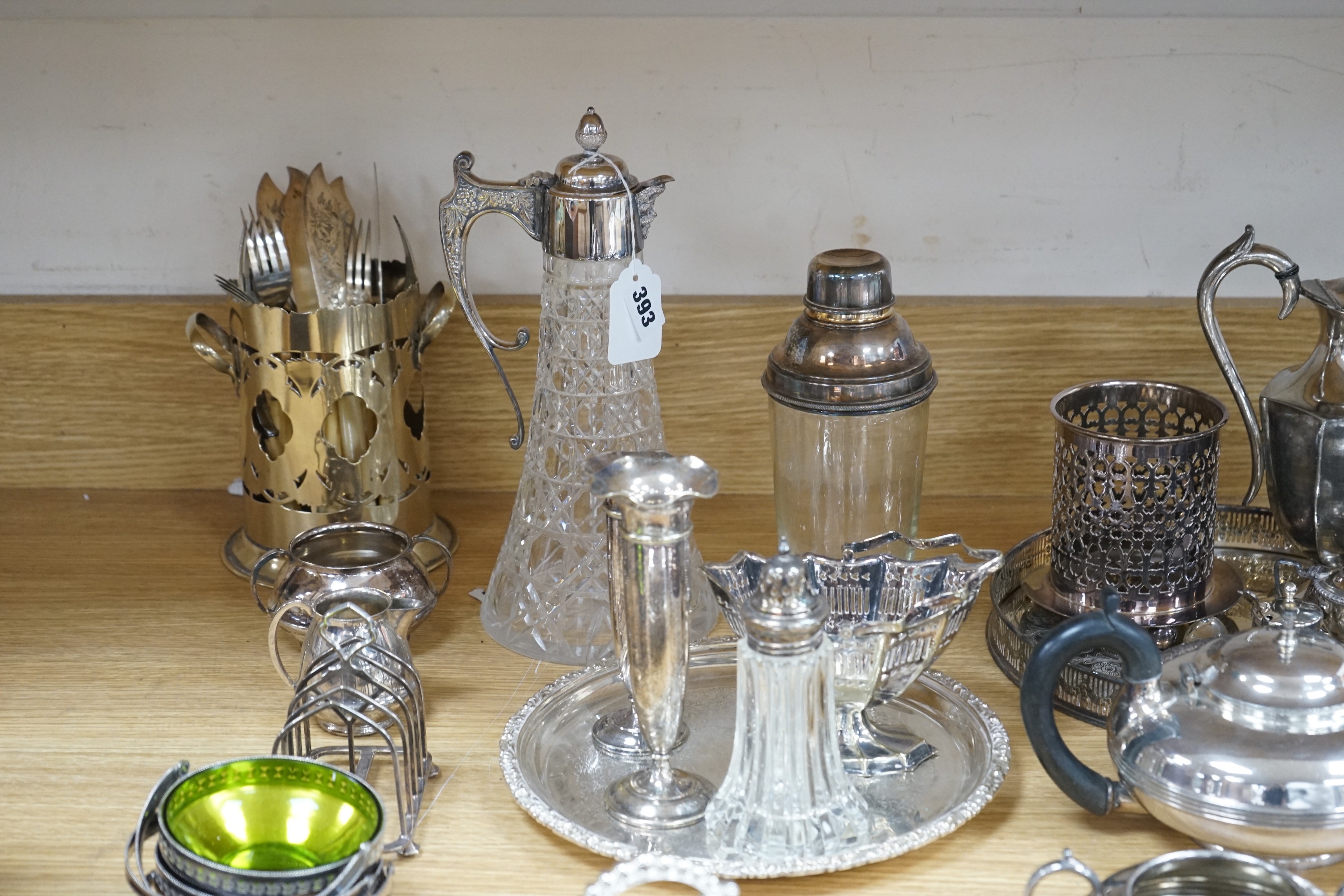 A quantity of silver plate including a cocktail shaker and a ewer